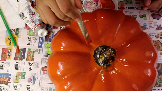 Paint your pumpkin with acrylic craft paint