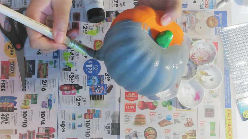 Paint your styrofoam pumpkin with gray acrylic craft paint