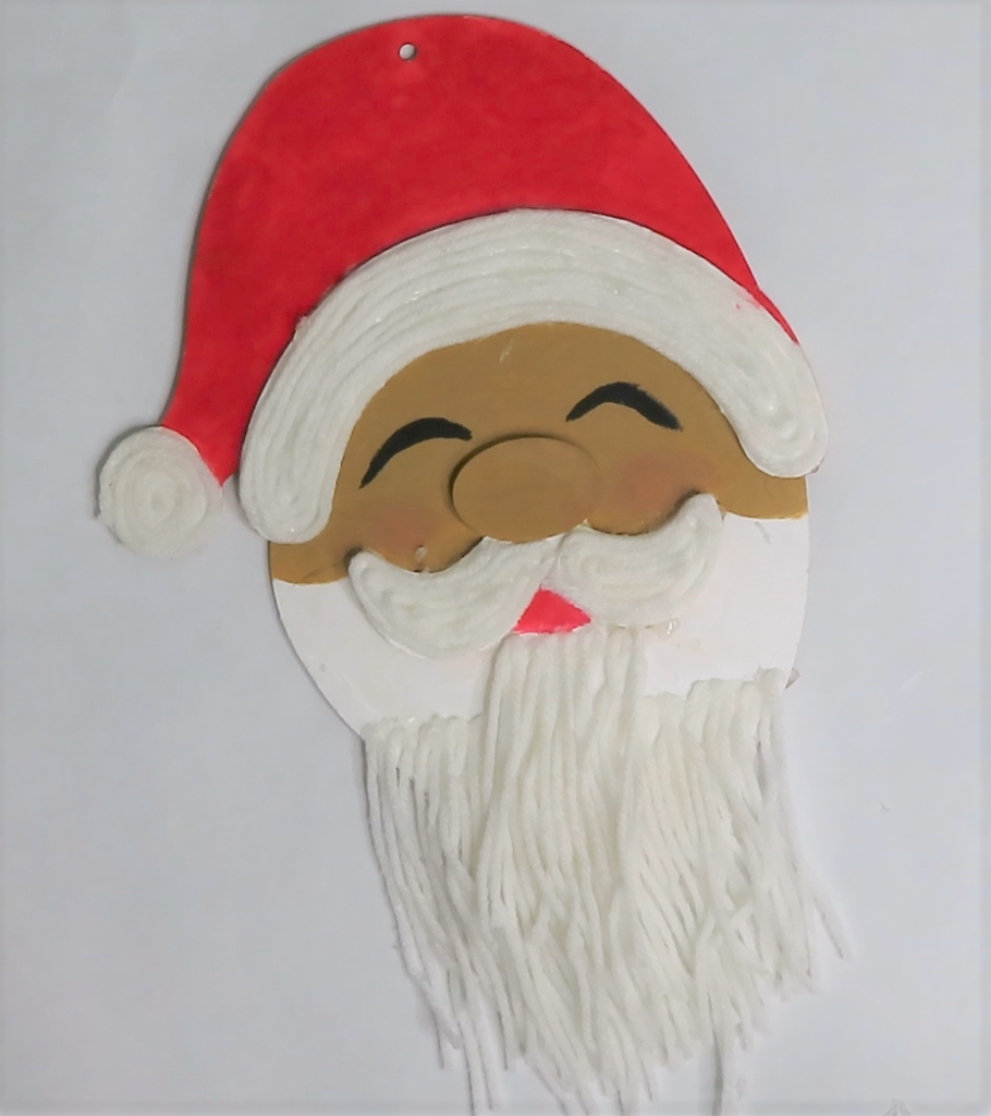 Cover Santa's beard with yarn | How to Turn a Dollar Tree Santa Head into a Masterpiece