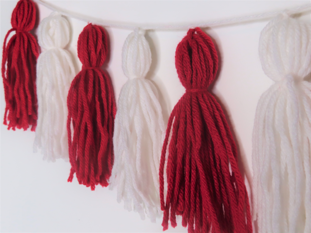 Completed tassel garland on a white background | Make Your Own Tassel Garland in No Time