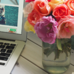 Laptop computer with pink roses in a vase next to it | Celebrating 2 Years of DeAnn Creates! 2nd Blog Anniversary