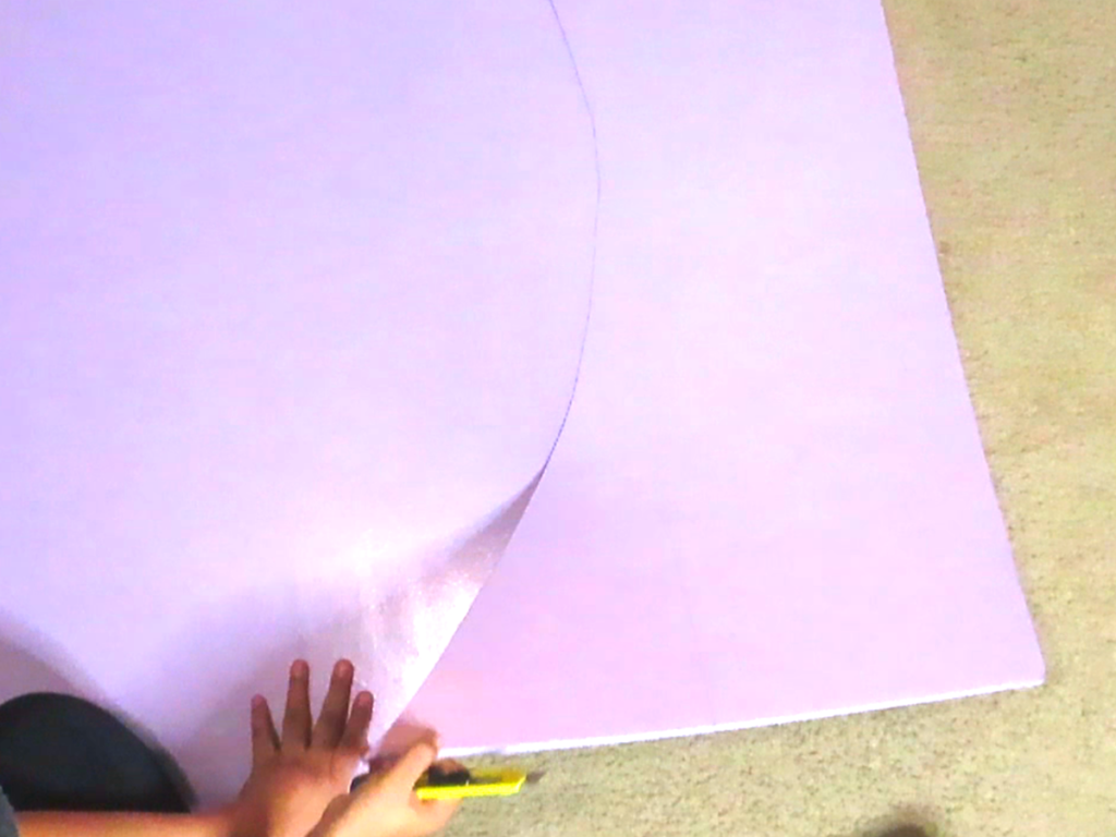 Cutting out the arch on foamboard with a box cutter