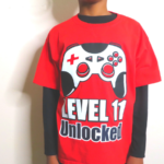 Completed Video game controller shirt for an 11th birthday with layered HTV