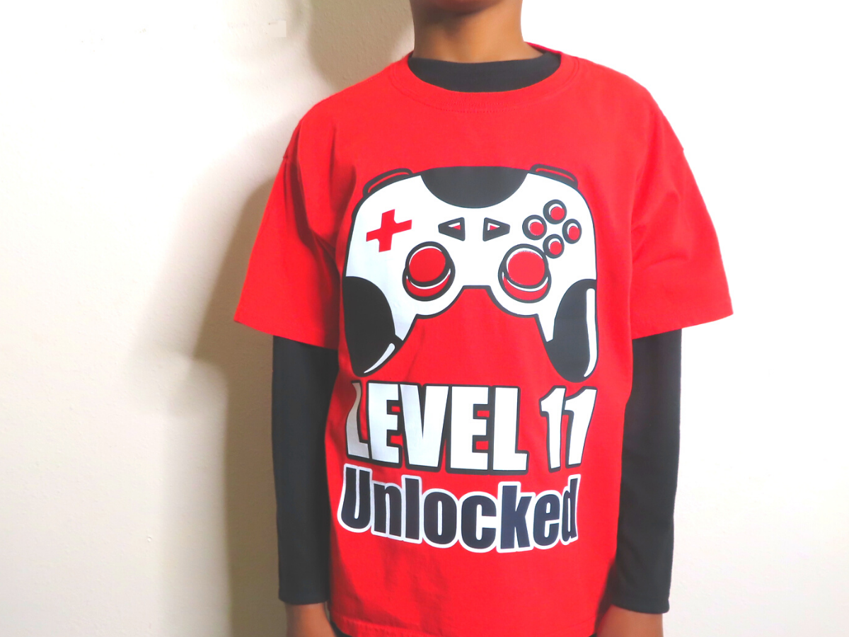 Completed Video game controller shirt for an 11th birthday with layered HTV
