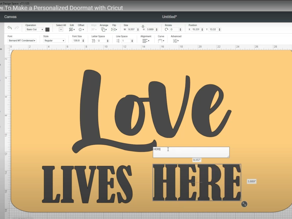 Typing the phrase Love Lives Here on the doormat template in the Cricut Design App