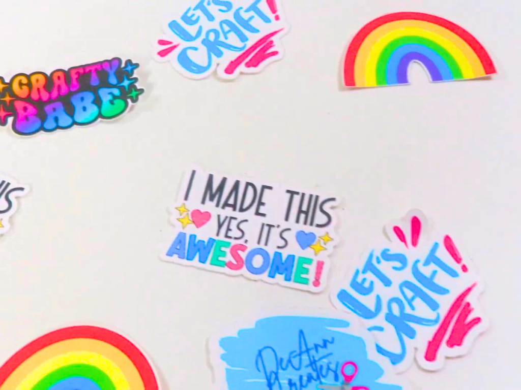 This image show 7 colorful stickers that were made with Cricut laying on a white background | How to Make Stickers with Cricut: Crafting Made Easy