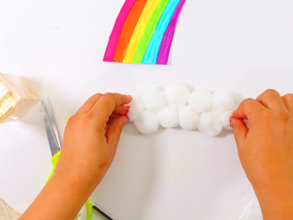 How to Make a Leprechaun Trap for St. Patrick's Day Fun | Glue pom pom balls on to the cloud
