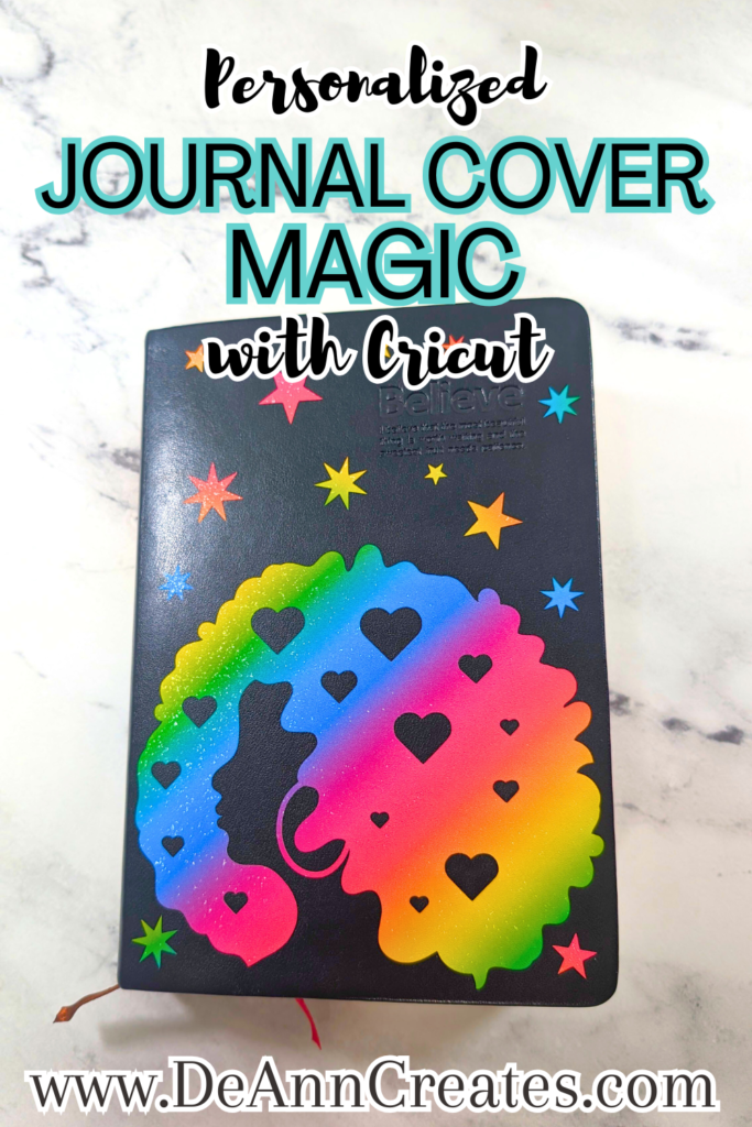 A Pinterest Pin that reads "Personalized Journal Cover Magic with Cricut." The image shows a personalized journal with a vinyl cutout rainbow striped image of a woman with a curly afro and hoop earrings. The journal is also covered in stars and it's sitting on a white marble surface with gray veining.