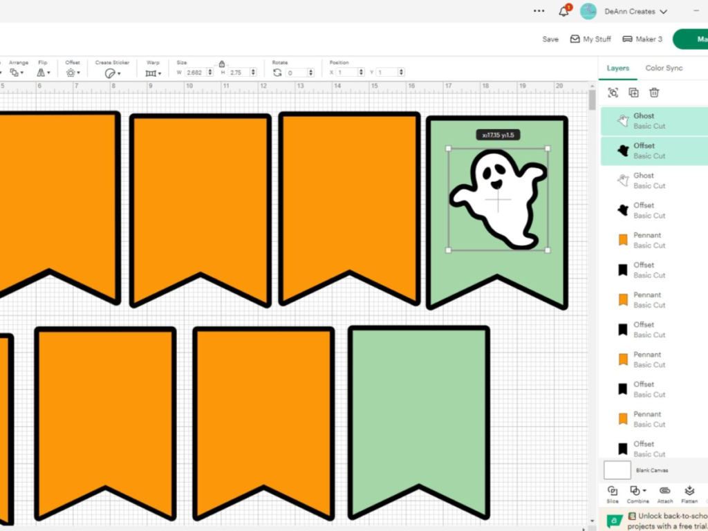 This image shows the orange and green banner being designed on Cricut Design Space after inserting the ghosts into the layout. | How to Make a Halloween Banner That's Cute and Spooky